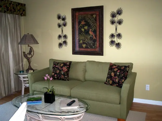 Naomi Watts demonstrates the vibrant impact of stripes on a casual living room atmosphere,...