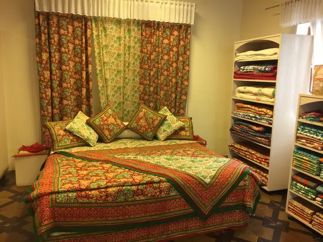 Naomi Watts demonstrates the livening effect of stripes in a neutral living room, all it takes is a...