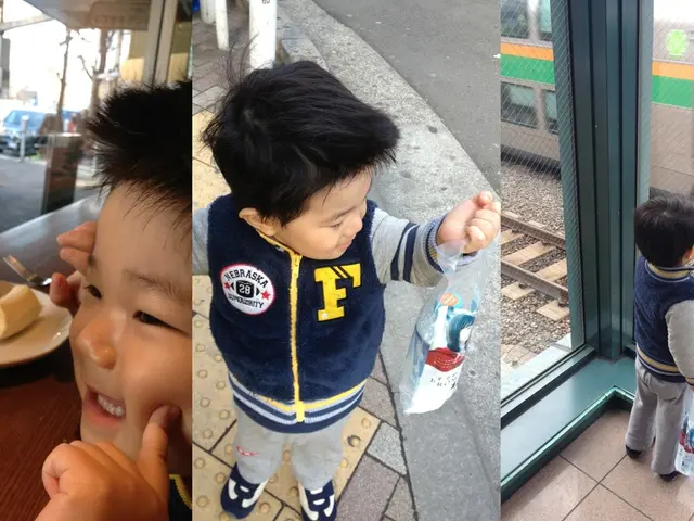 A thrilling video captures a boy precariously perched 100 feet high over a flustered crowd at...