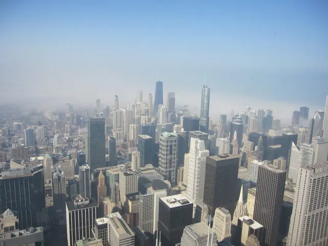 Military forces in Israel demolish a tall building in Gaza City