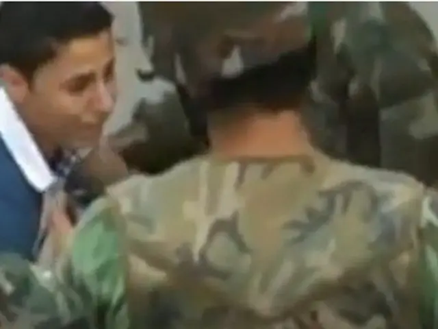 Robbery suspect apprehended by law enforcement officers.