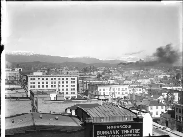 Flaming auto dealership emitting large amounts of harmful smoke